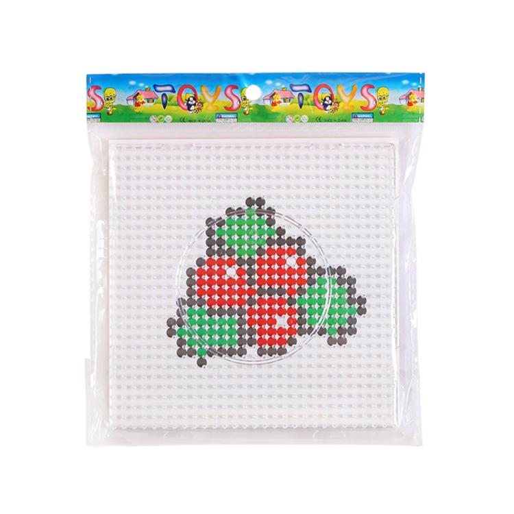 Christmas fuse bead craft template featuring a penguin with a red scarf