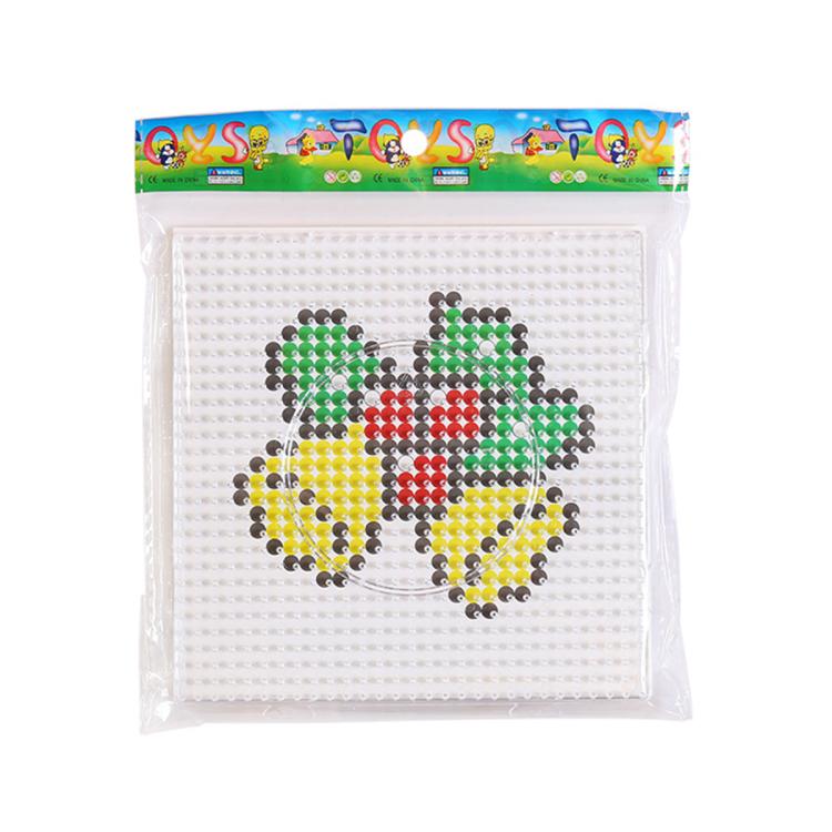 Christmas fuse bead craft template featuring a snowman with green and yellow accents