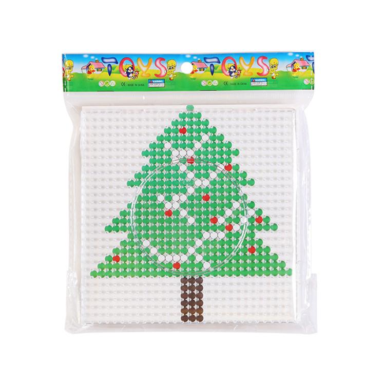 Christmas fuse bead craft template featuring a green tree with a brown trunk