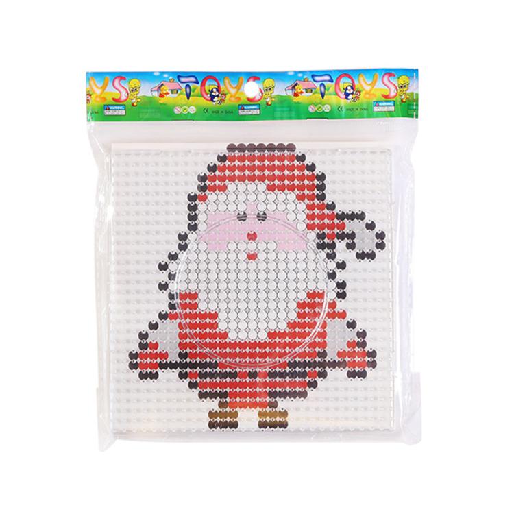 Christmas fuse bead craft template featuring a Santa Claus face with red hat