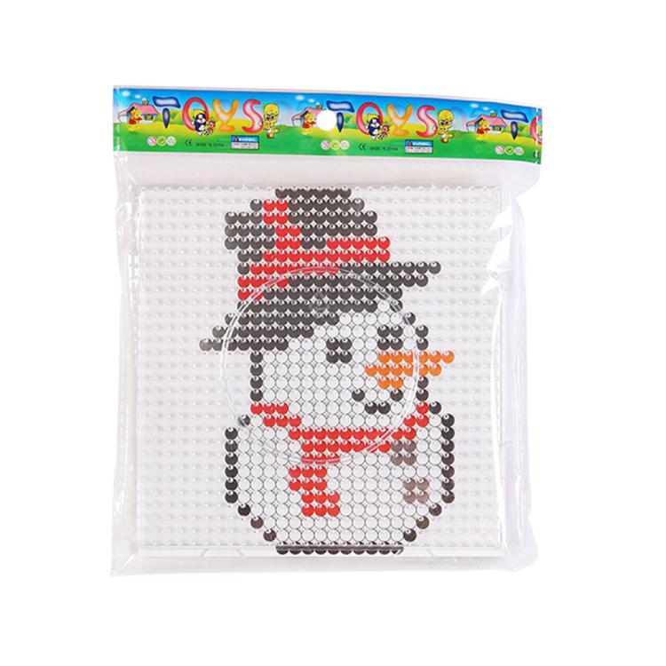 Christmas fuse bead craft template featuring a snowman holding a red sign