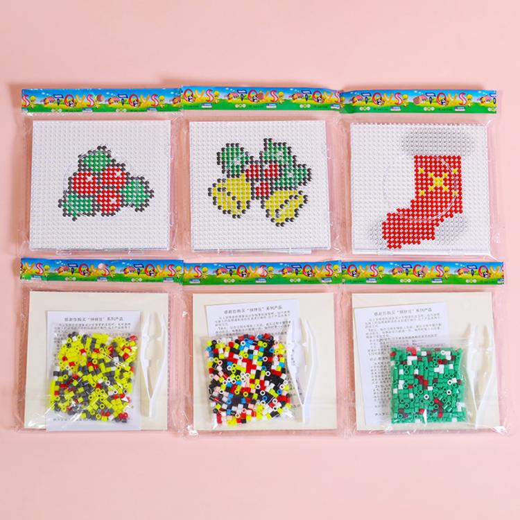 Christmas fuse bead craft set layout with several themed bead packs