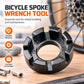 Black multi-size bicycle spoke wrench with labeled hex slots around the circular opening