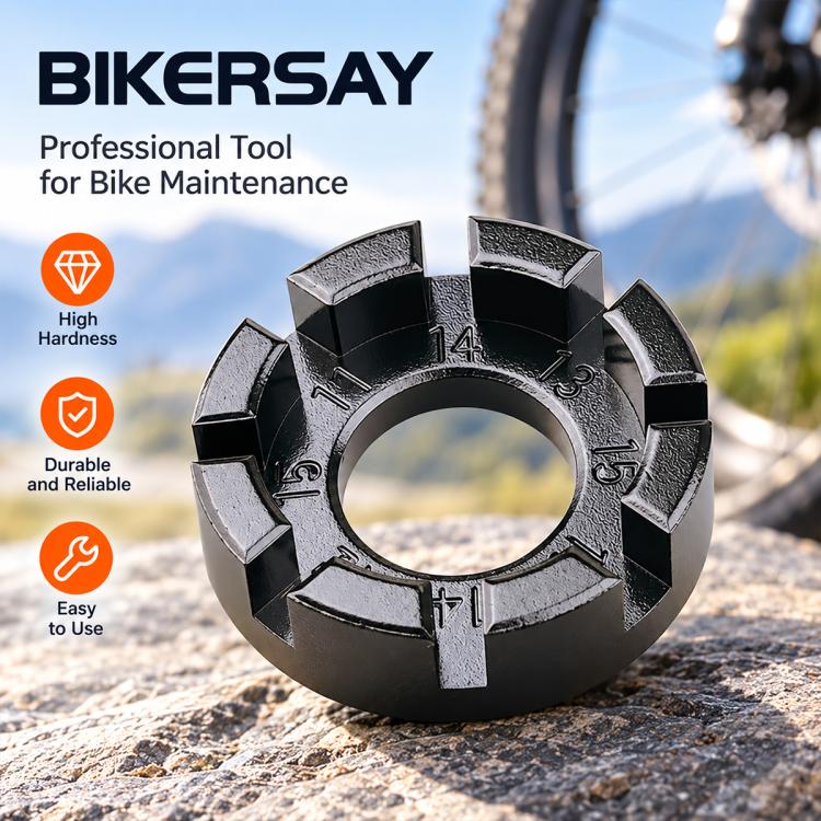 Dark bicycle spoke wrench tool with durable metal body and numbered hex cutouts