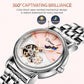 Women’s automatic mechanical watch close-up with silver case, openwork moon-and-stars dial