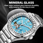 Dulunwe men's automatic mechanical watch close-up with silver case and teal blue dial