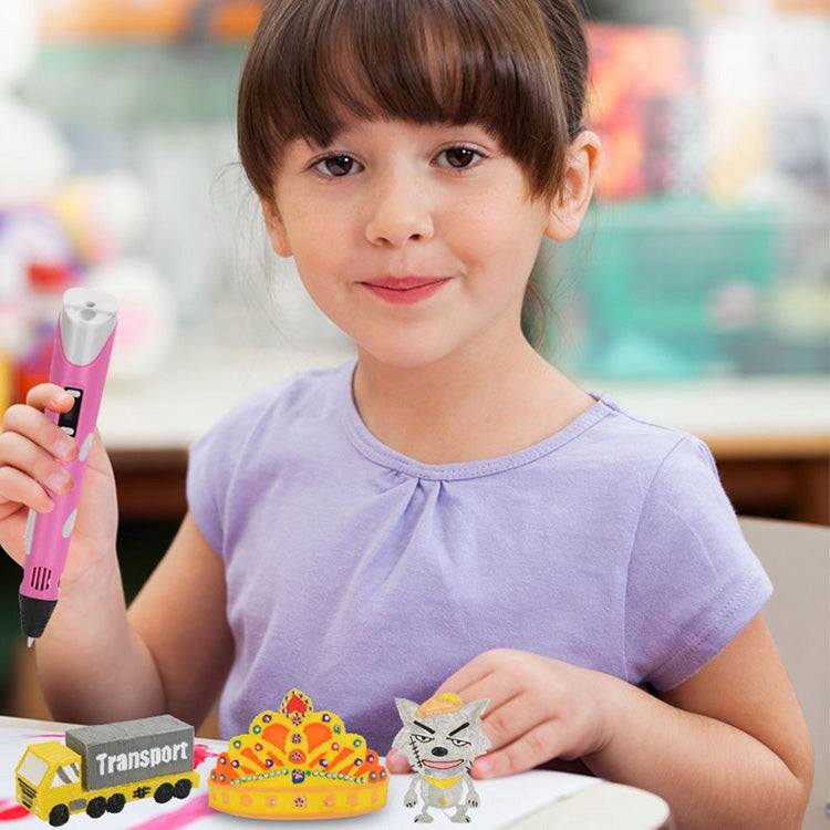 Hand-held 3D printing pen with USB plug, pink, held in a child’s hand