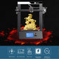 Desktop 3D printer with LCD screen and visible figurine in build chamber