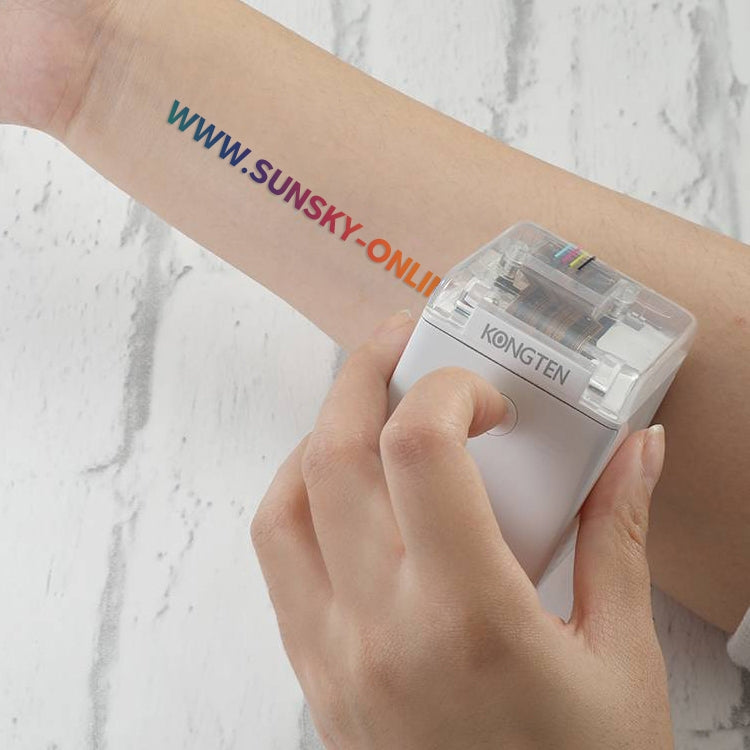 White mini portable color printer held in hand with clear top window