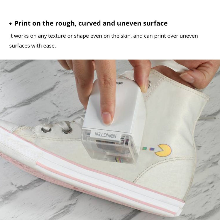 Mini portable color ink printer with clear cartridge, pressing onto a fabric pouch