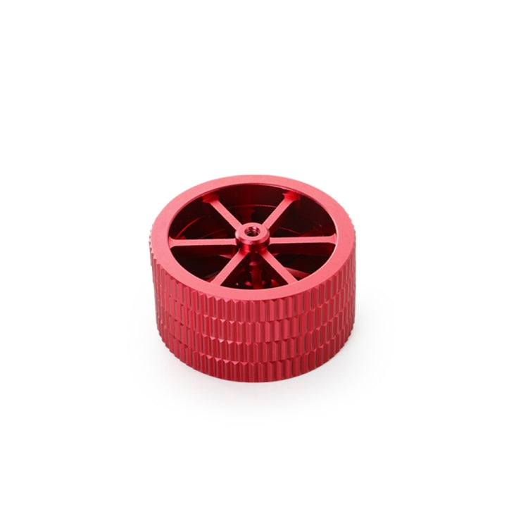 Red metal hand-screw leveling nut with four spoke wheel and knurled outer ring