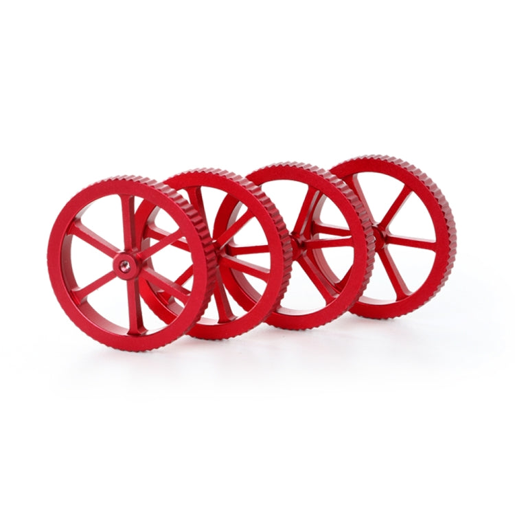 Set of red metal leveling nuts showing multiple four-spoke hand-screw wheels
