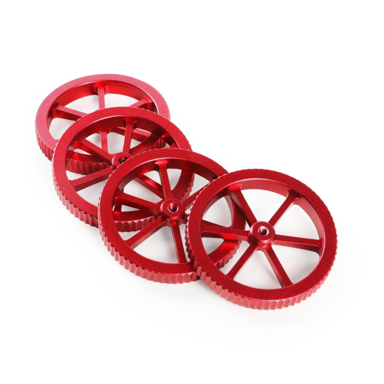 Four red metal leveling nuts with four-spoke hand-screw wheels and knurled edges
