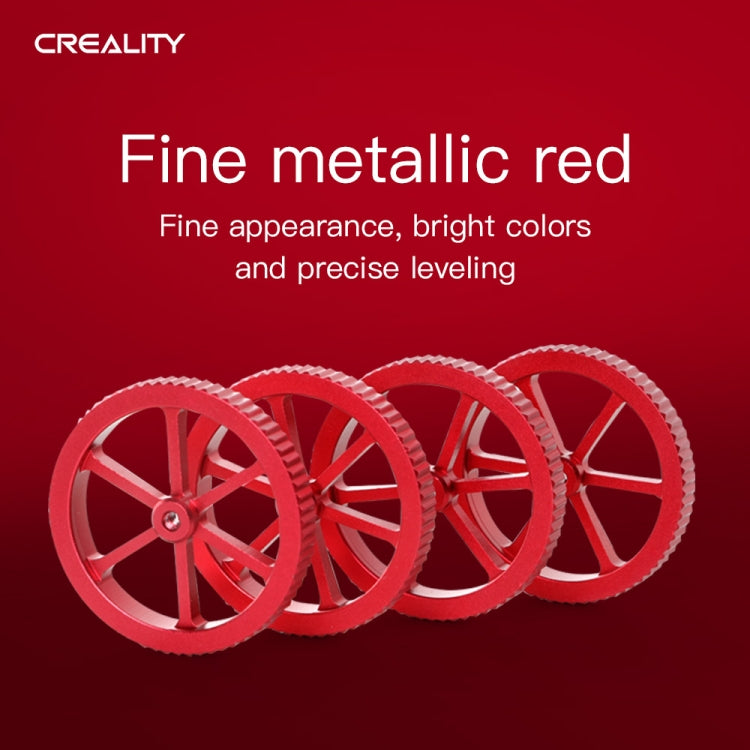 Cluster of red metal four-spoke hand-screw leveling wheels for a 3D printer bed