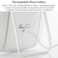 Rechargeable LED makeup mirror with charging cable plugged in on white base