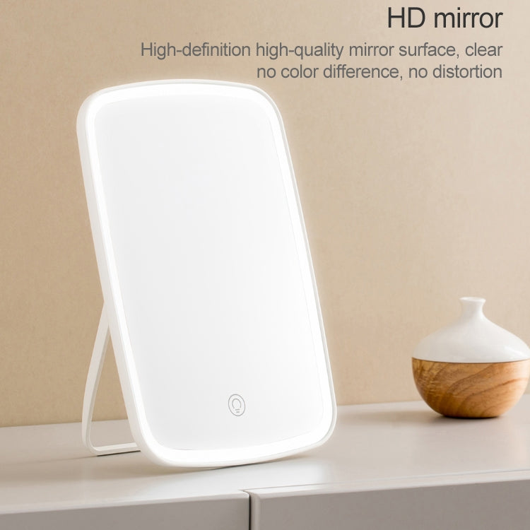 HD LED makeup mirror with white bezel and folding stand on a base