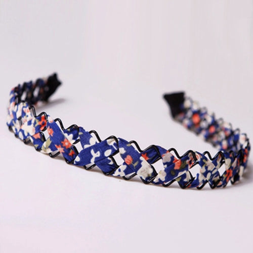 Navy hollow braid hair hoop headband with colorful cartoon block pattern, coiled ring.