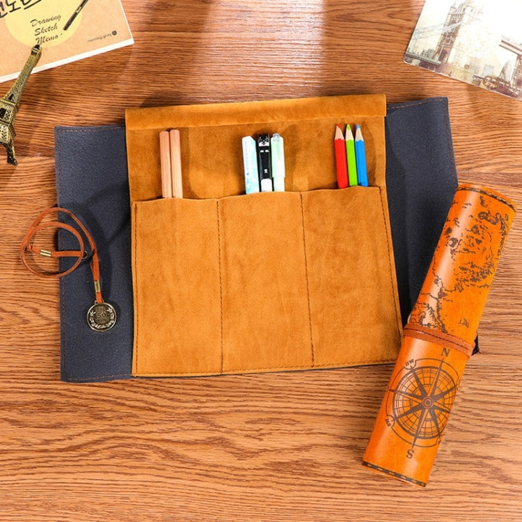 Suede-style pencil bag open with tan slots and blue side pouch; holds pens and orange map roll.