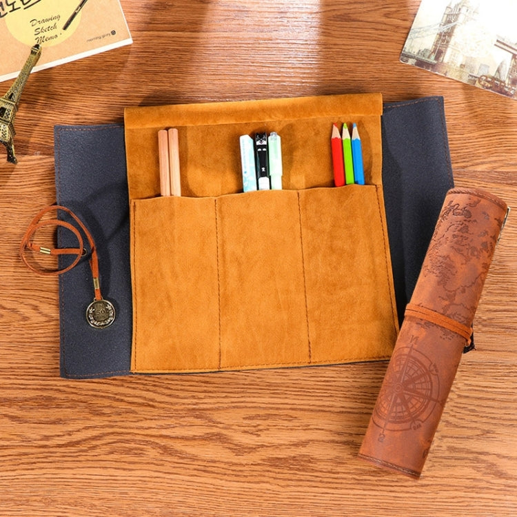 Suede-style pencil bag open with tan slots and blue side pouch; holds pens and tan map roll with orange trim.
