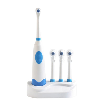 Blue and white electric rotary toothbrush with charging base and four replacement heads