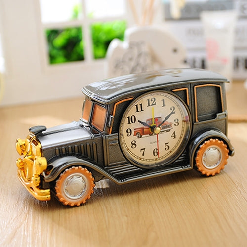 Vintage car model alarm clock, dark gray with gold details and round analog dial