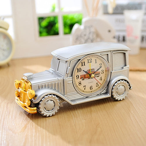 Vintage car model alarm clock, light silver car body with round analog dial