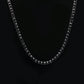 Black crystal necklace chain featuring evenly spaced prong-set stones