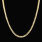 Gold-tone single-row crystal chain necklace with bright oval stone border
