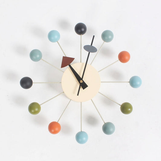 Wall clock with mint and dark ball arms, cream face, black minute and hour hands