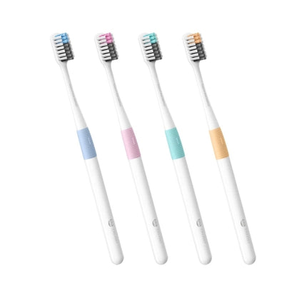 Set of 4 manual soft toothbrushes with white handles and colored brush heads