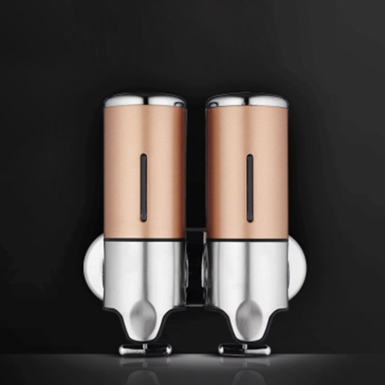 Dual wall-mounted manual soap dispenser, gold and chrome twin bottles