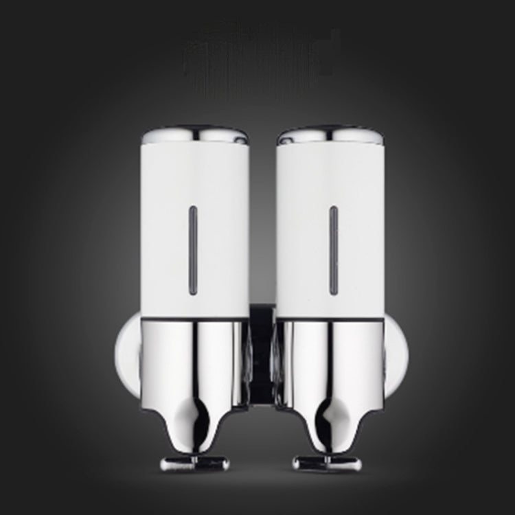 Dual wall-mounted manual soap dispenser, white twin bottles with chrome base