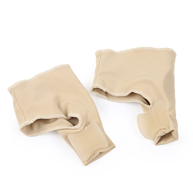 Pair of beige toe correction sleeves with open toe cutouts and padded separator