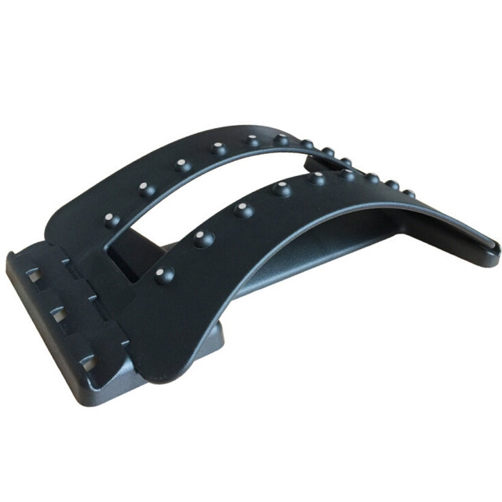 Black lumbar traction and massage brace with curved arms and round magnet points