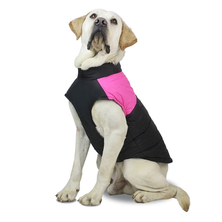 Black and pink padded dog ski vest with arm openings, worn by sitting dog
