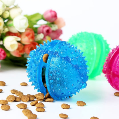 Blue spiked rubber puppy bite ball toy with treat pocket and side opening