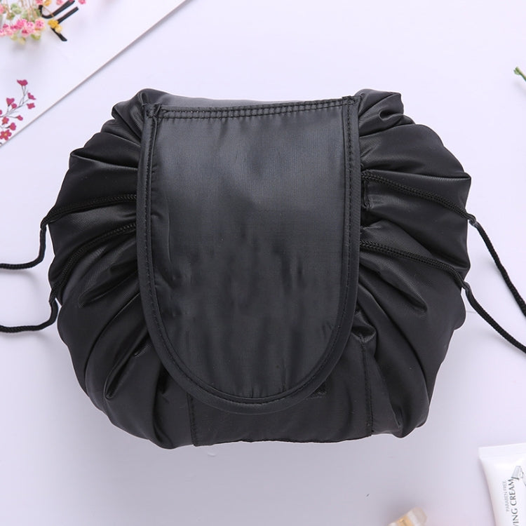 Black ruffled drawstring cosmetic storage pouch with stitched front panel