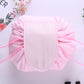 Pale pink ruffled drawstring cosmetic storage pouch with stitched front panel