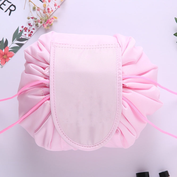 Pale pink ruffled drawstring cosmetic storage pouch with stitched front panel