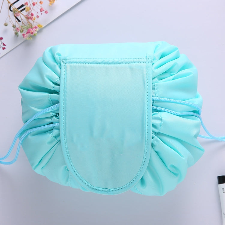 Mint green ruffled drawstring cosmetic storage pouch with stitched front panel and side ties