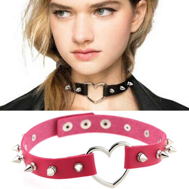 Pink leather heart choker with silver heart pendant and metal rivets, spike studs.