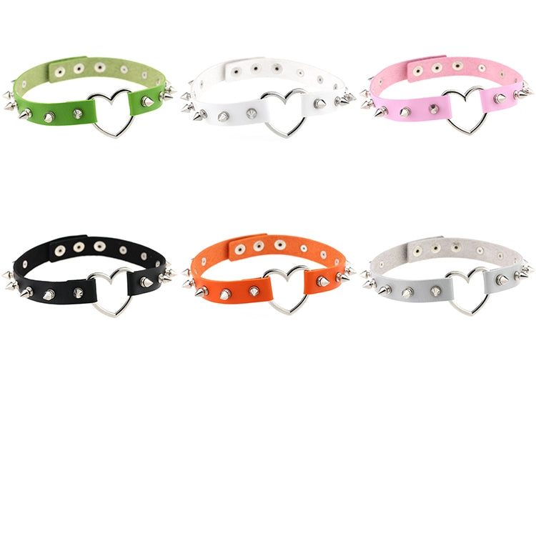 Assorted colored leather heart chokers with silver heart pendants and metal rivets.