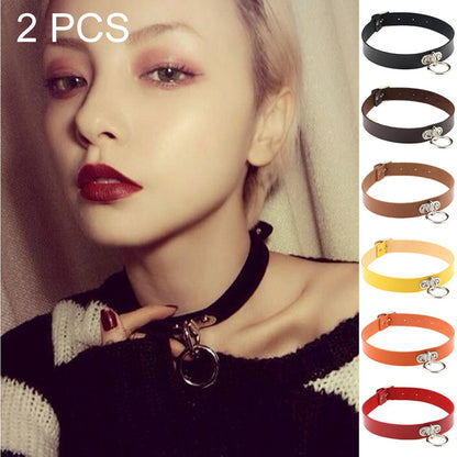 Black faux leather choker collar with heart-shaped lock charm and O-ring