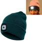 Teal knit winter beanie with circular LED light patch on the side