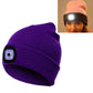 Purple knit winter beanie with side LED light patch and circular control window