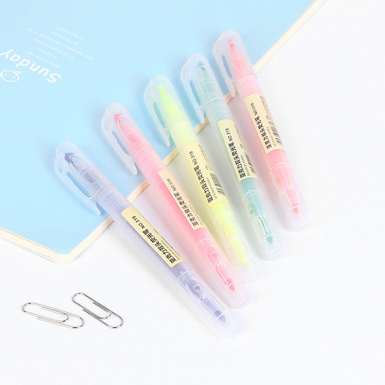 Colorful double-head highlighters in a row, clear barrels with pastel tips