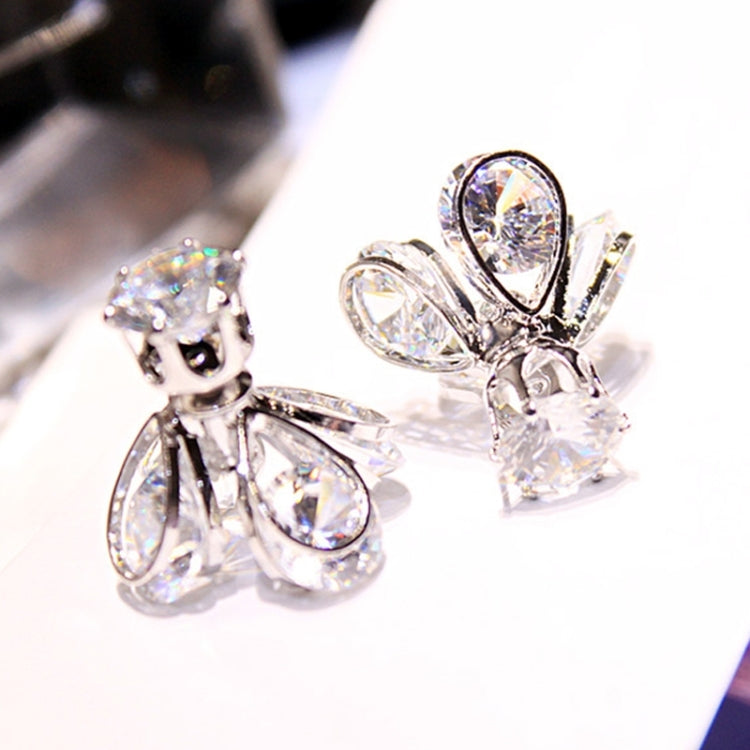 Silver crystal firefly drop earrings with teardrop stones and fan-like details