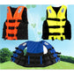 Assorted children’s life jackets in orange, blue, and yellow with black straps