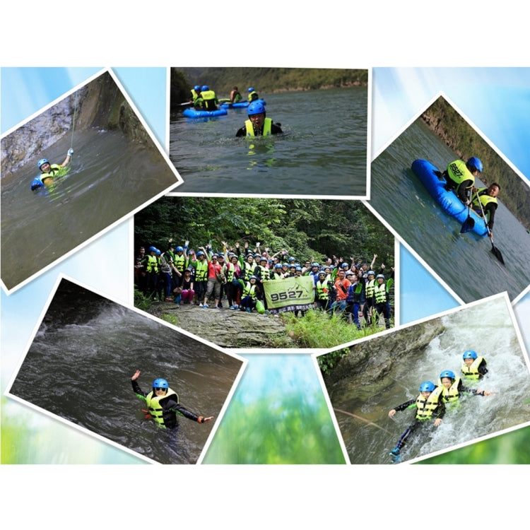 Group activity with children wearing neon blue life jackets and helmets