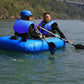 Blue and black life jacket with adjustable straps and circular emblem